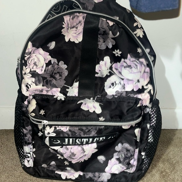 It a book bag that’s from justice and it’s in good condition - Picture 1 of 1